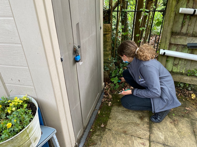 a team member measuring a playground